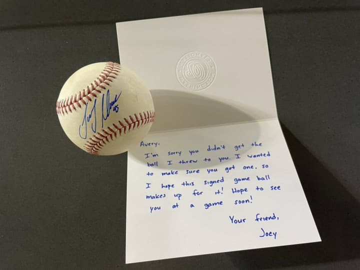 Joey Meneses signed the ball and sent a note to the little girl.