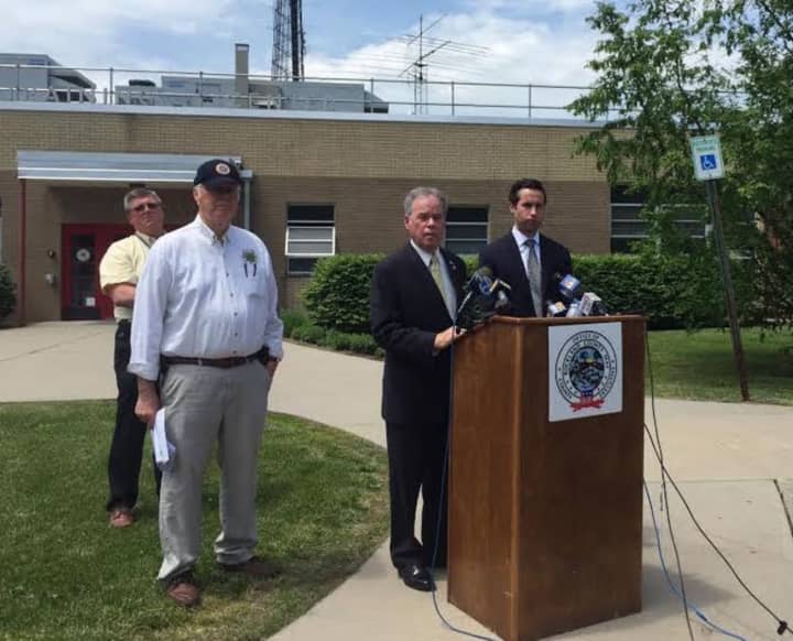 County Fire and Emergency Director Gordon Wren Jr., County Executive Ed Day, and Assemblyman Ken Zebrowski at a May press conference concerning inspections of private schools.