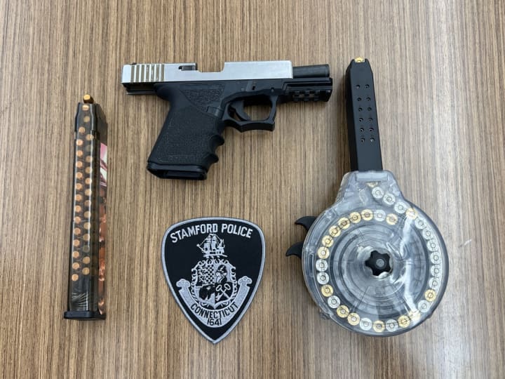 The gun and ammo magazines seized during the teen&#x27;s arrest.