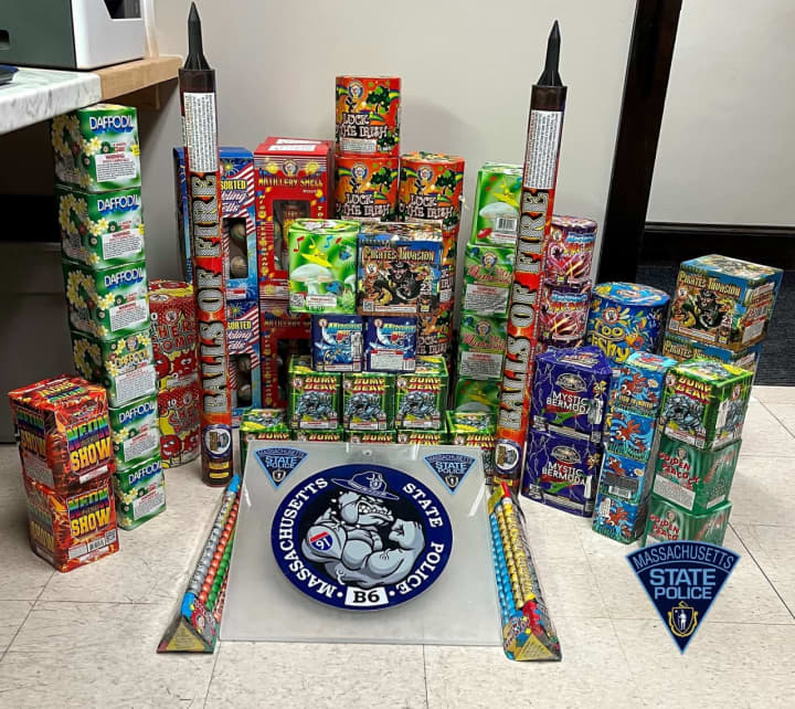 Massachusetts State Police seized 64 boxes of fireworks during a routine traffic stop in Hatfield over the weekend.