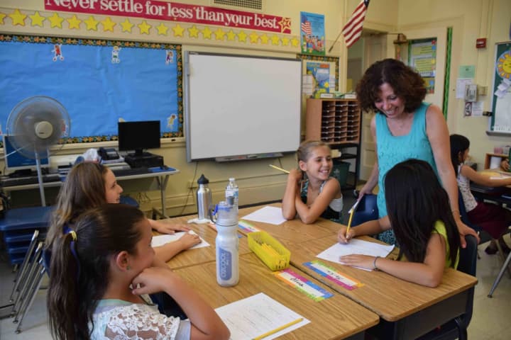 Students and teachers meet on first day of school.