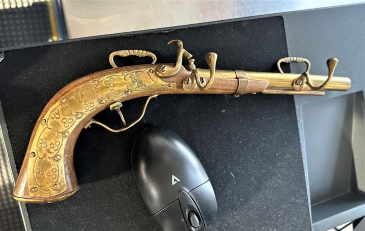 A replica of a Flintlock pistol turned into a key hook was found in a woman&#x27;s carry-on bag at Bradley International Airport.