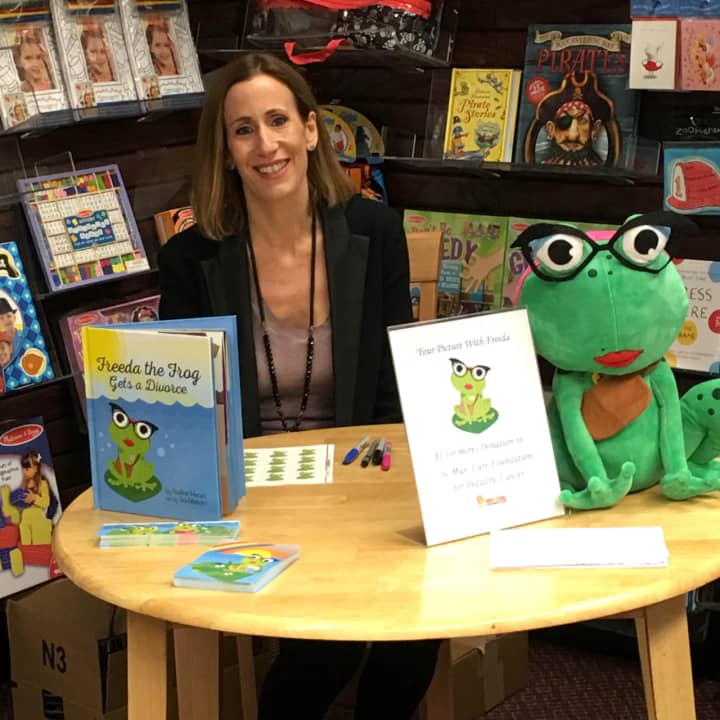 Tenafly author Nadine Haruni signed copies of her book &quot;Freeda the Frog Gets a Divorce&quot; at Womrath&#x27;s Bookstore