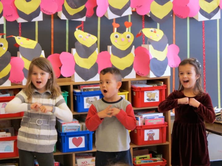 Increase Miller Elementary School kindergartners acted out the story, “Froggy’s First Kiss” for their parents in celebration of Valentine’s Day.