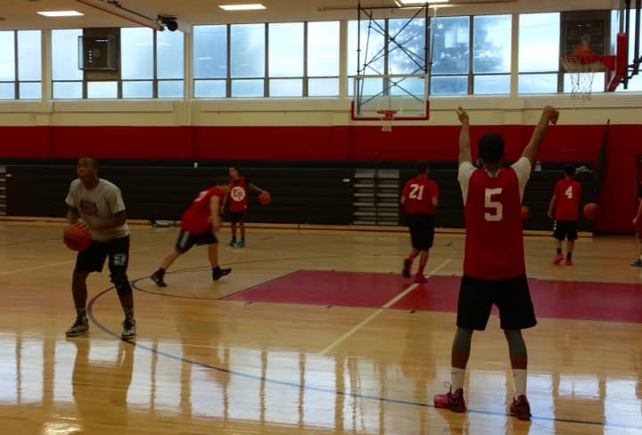 The Elmwood Park Crusaders hone their skills during basketball practice Wednesday, Dec. 16.