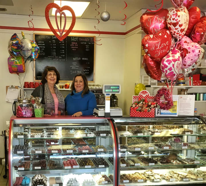 Helen Gould, left, and her sister, Diana Gould run Chocolate Rain Shop in Norwalk.