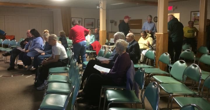 People gather for a film screening about climate change at the Ethical Culture Society of Bergen County in Teaneck.