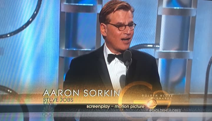 Scarsdale native Aaron Sorkin with his Golden Globe for best screenplay for &quot;Steve Jobs.&quot;