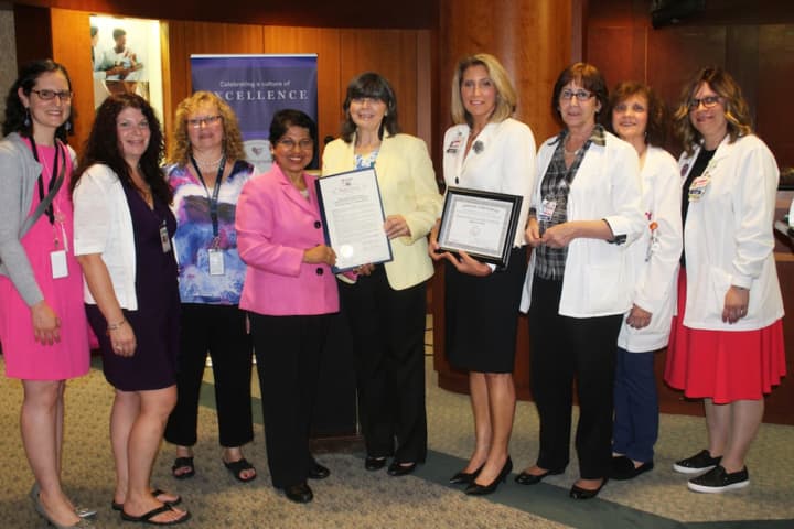 Hospital officials, staff and county leaders celebrating at the Breastfeeding Friendly Worksite ceremony. (See article for those shown here.)