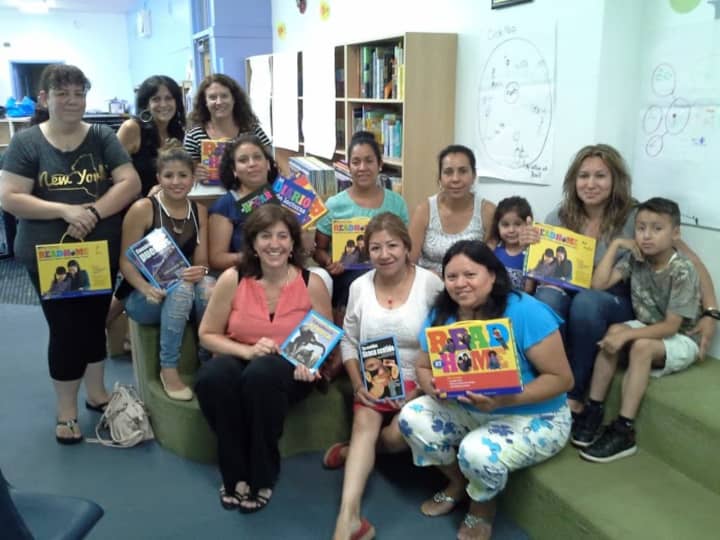The parents learned strategies they can use at home to develop academic reading skills. Each family received a bilingual Read At Home Kit.