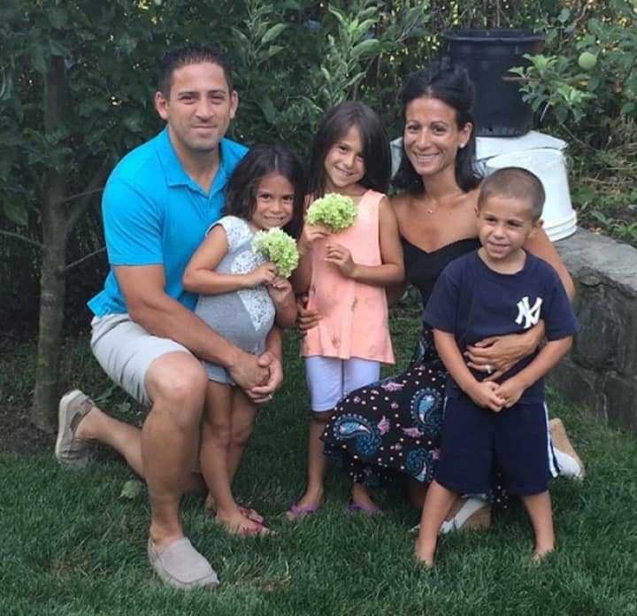Dana and Carmine Gentile -- shown with Gia, center, and her two siblings -- are hoping to pay it forward by helping the families of other children with Neuroblastoma.
