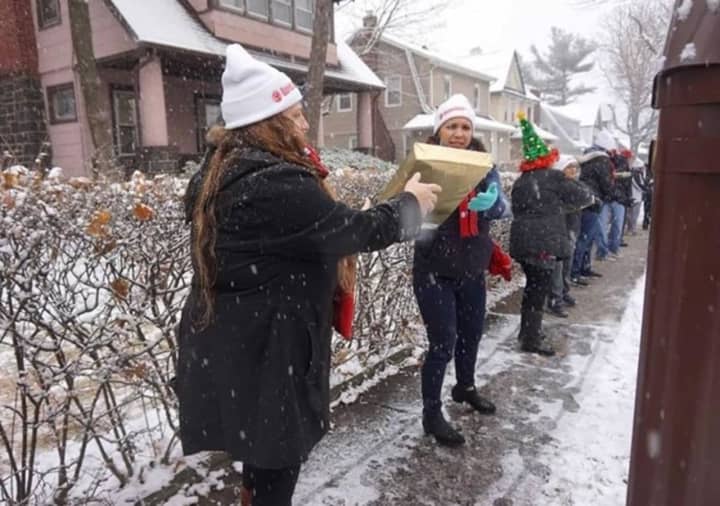 Volunteers joined together to deliver toys.
