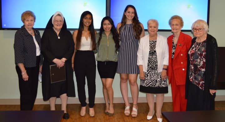 From left, Patricia Fraleigh. Sister Mary McCaffrey; Jhoely Duque, a graduate of Lakeland High School; Jessie Zhanay of Peekskill High School; Danielle Merante, a graduate of Walter Panas High School; Marie Turner, Virginia Rederer and Donna Edwards.