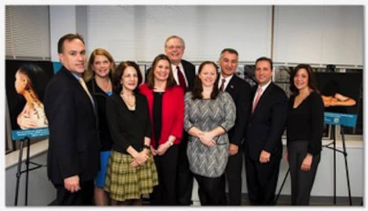 Shown at The Center for Sexual Assault Crisis Counseling and Education, from left,  Peter Tesei, Jayme Stevenson, David Martin, Carlo Leone, Bob Duff, Gayle Weinstein; front, from left, Gail Lavielle, Ivonne Zucco and Veleska Martin.