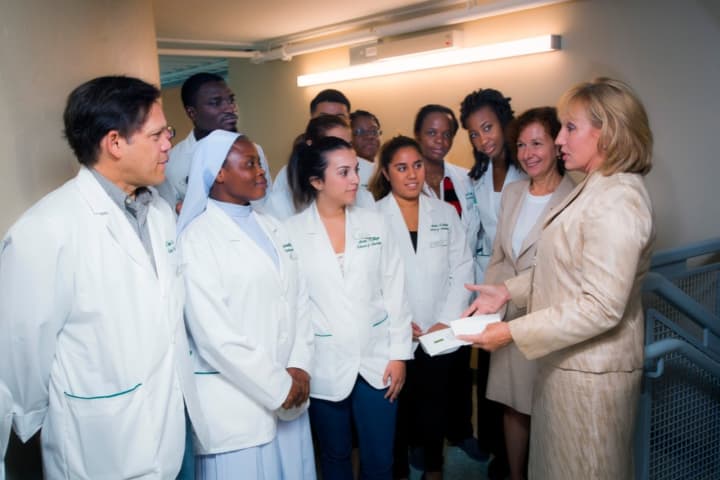 Lieutenant Gov. Kim Guadagno (right), Dr. Anne Prisco, president of Felician College (second from right) with Felician College nursing students at the grand opening of the newly renovated Education Commons on the college’s Rutherford campus.