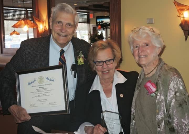 Hans and Ellie Spiegel, shown here receiving an award from Senator Loretta Weinberg of Teaneck, are founders and long-time members of the Leonia Peace Project, celebrating Sunday Feb. 7 in the library.