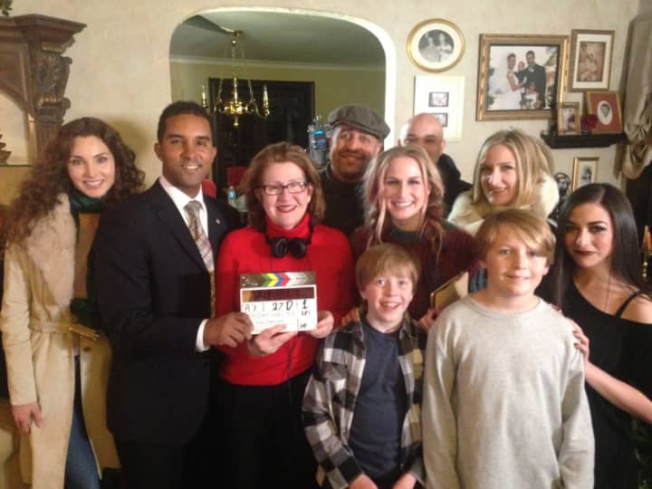 The cast and crew with Mount Vernon Mayor Richard Thomas. Director Pat Denson is in the middle in red.
