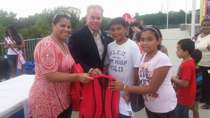 Shown at last year&#x27;s backpack event in Haverstraw are, from left, Emily Dominguez, chairwoman of the Haverstraw Neighborhood Fund; Rockland County Executive Ed Day; and two unidentified schoolchildren.