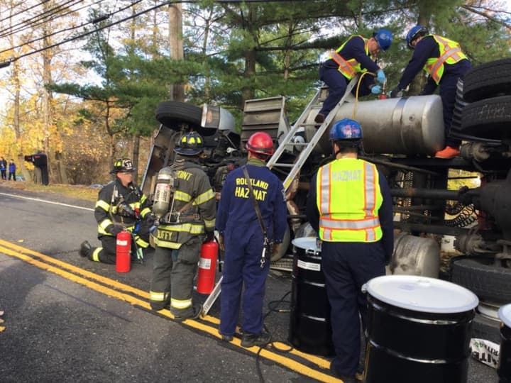 Rockland County&#x27;s Hazmat Team ensured a safe and efficient transfer of the remaining diesel fuel and hydraulic fluid from the overturned tractor-trailer carrying logs on Route 9W in Stony Point.