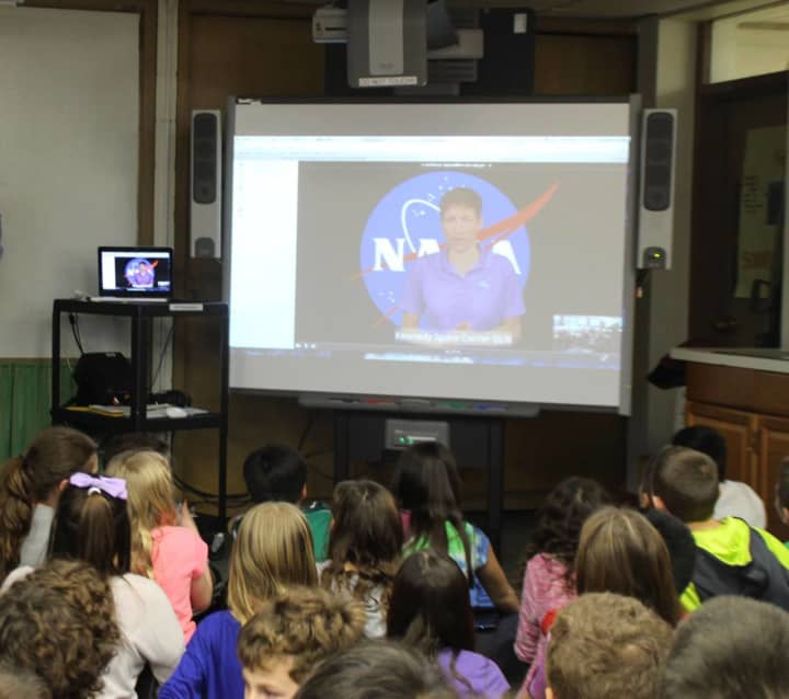 Heathcote School fifth-graders get a live video lesson from a NASA educator at the Kennedy Space Center.