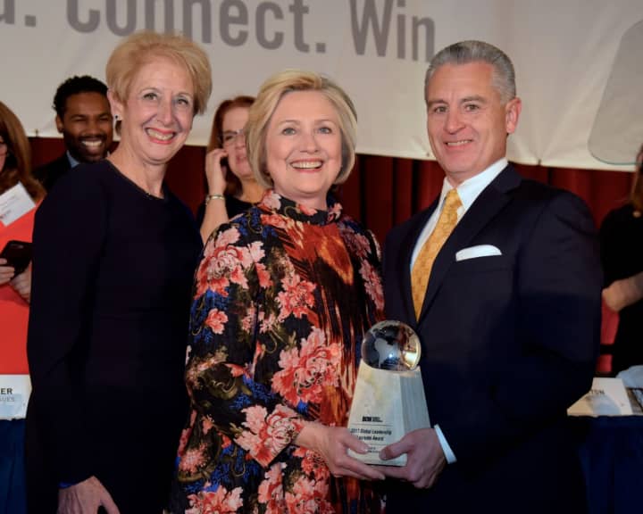 Hillary Clinton, center, with Anthony Justic, BCW Board Chairman, right, and BCW President and CEO Marsha Gordon, left.