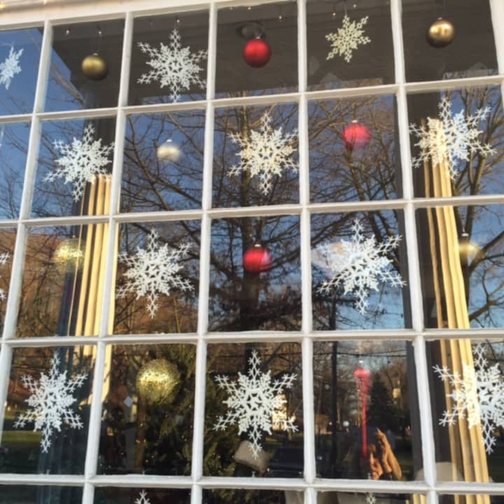 With this usually warm December weather, the sparkly flakes hanging in the window of The Horse Connection, a tack shop in Bedford Village,  may be the only snow we see this Christmas.