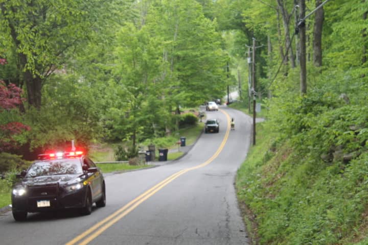 State police on the scene as Mahopac Fire Police detour traffic away from the accident.