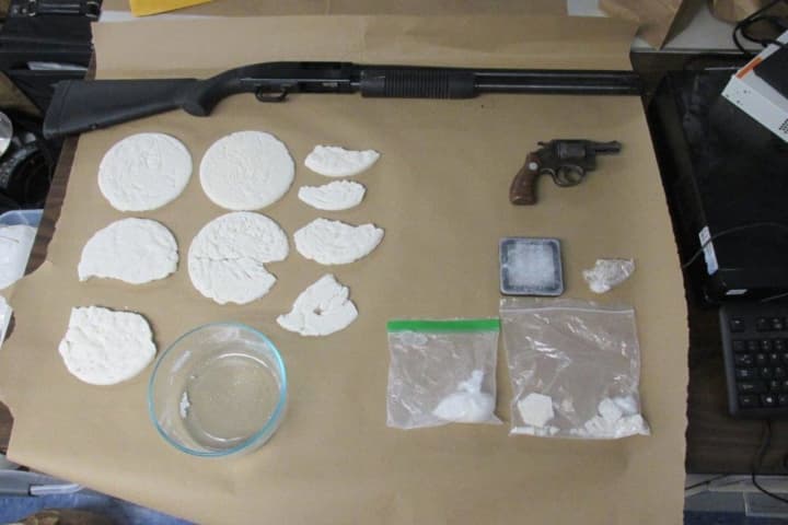A look at the drugs and weapons seized.