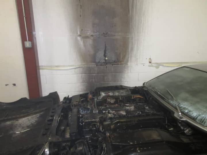 The sprinklers kept a very hot fire contained to the Lamborghini’s engine compartment.