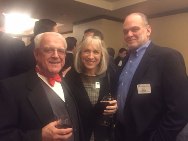 Paul Timpanelli, left, and guests at the Bridgeport Regional Business Council&#x27;s holiday dinner