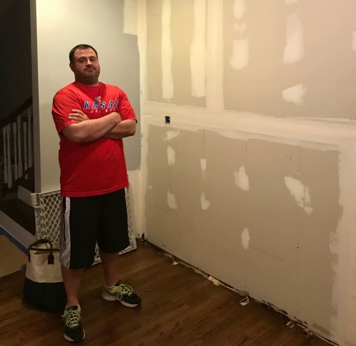 Oradell&#x27;s Dave Dankin waits for the Siricos to finish work on his kitchen.
