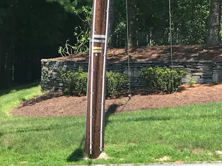 Piping has been installed on some Mahwah utility poles.