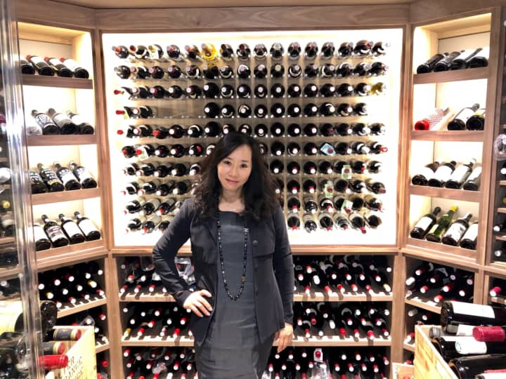 Christine Bae&#x27;s 1,500-bottle wine cellar in her Norwood home is beyond capacity. Her collection has grown to 3,000 bottles.