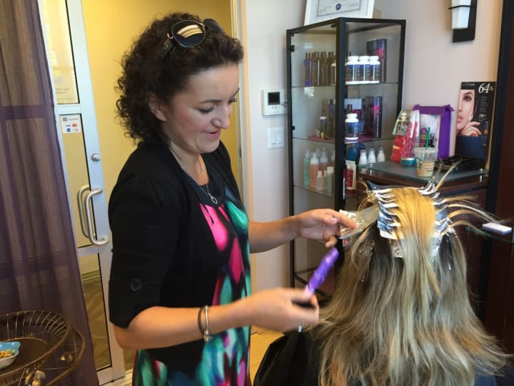 Ela Dalka works with a client at MY SALON Suites Thursday morning.