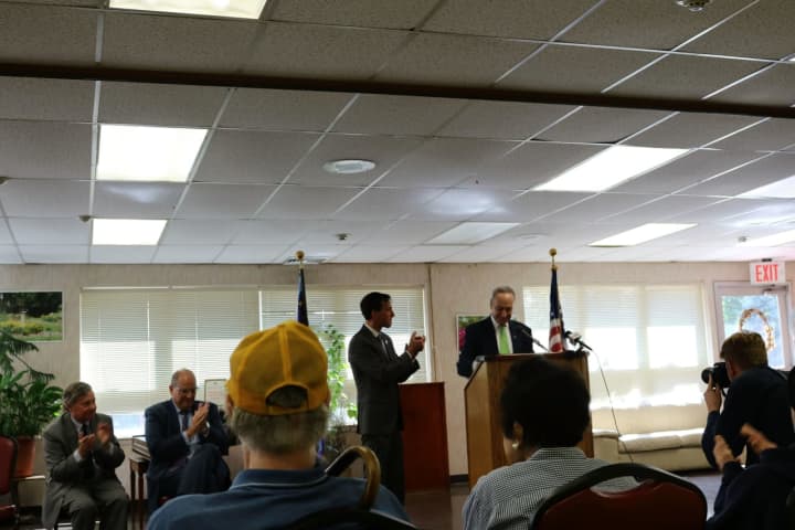 New Rochelle Mayor Noam Bramson introducing U.S. Sen. Chuck Schumer at the Hugh A. Doyle Senior Center.
