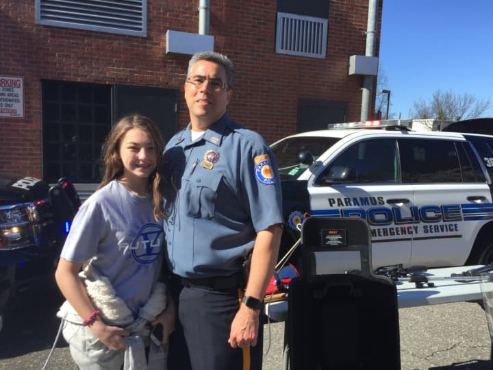 This year&#x27;s Take Your Kids To Work Day at the Paramus Police Department was organized in part by Detective Doug Ohlendorf, pictured here with his daughter, Abigail, 14.