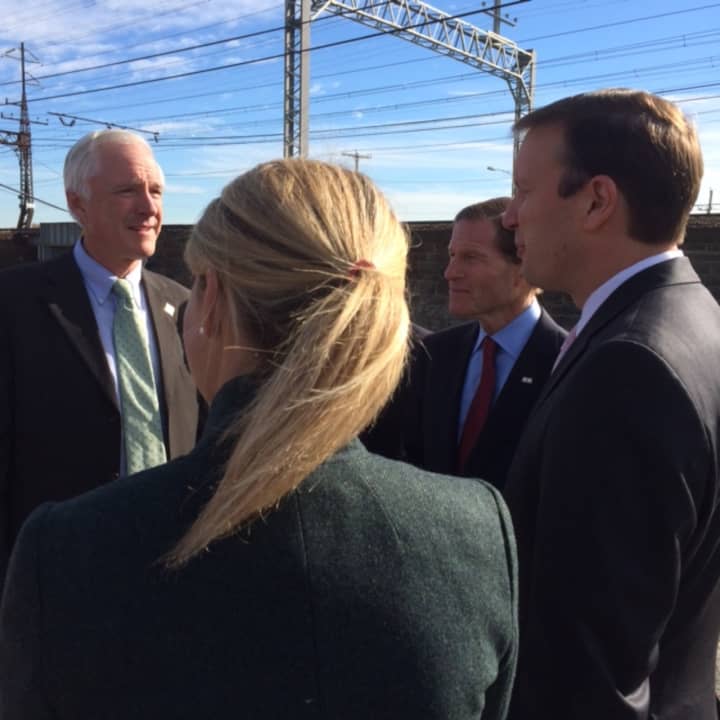 Bridgeport Mayor Bill Finch speaks with Federal Railroad Administrator Sarah Feinberg and U.S. Sens. Richard Blumenthal and Chris Murphy on what they hope will be the future site of Bridgeport&#x27;s second train station. 