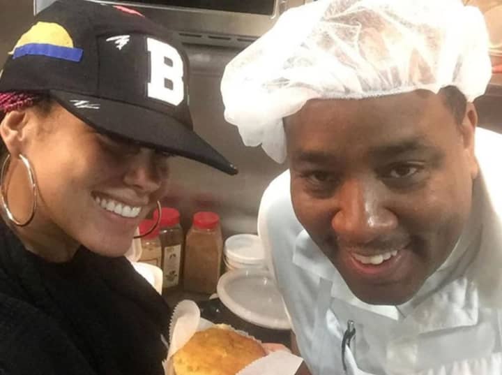 Alicia Keys poses for a photo with Tod Wilson, of Mr. Tod&#x27;s Pies in Englewood.