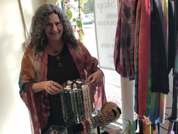 Karen Lauber shows off some items offered at her Wyckoff store.