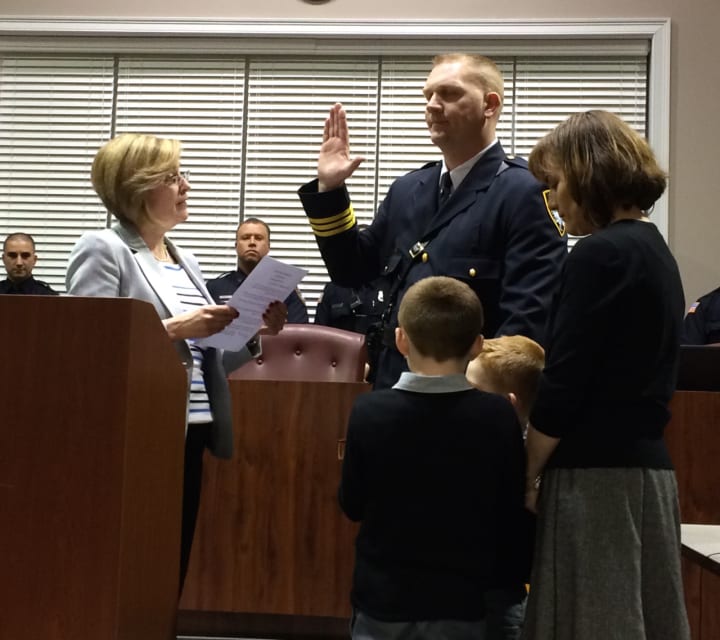 Little Falls Mayor Darlene Conti swears in new Police Chief Steve Post Monday, Dec. 7.