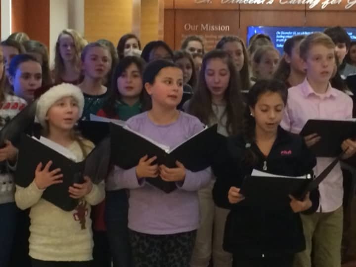 Students from Trumbull&#x27;s Hilltop Middle School sing at the St. Vincent&#x27;s Medical Center tree lighting Dec. 1. 