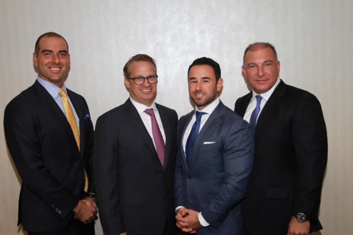 Joe Juliano, Dennis Brown, Robert Tuzza and Chris Kral (from left to right) of Fairfield-based Kral Brown Group appear on the Financial Times&#x27; Top 401 Retirement Advisors list.