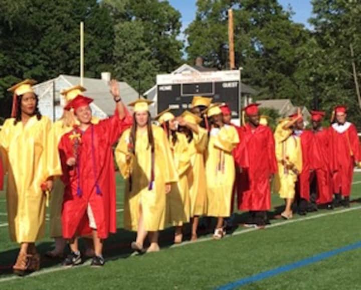 Graduates wave to their families at a recent Stratford High School commencement.