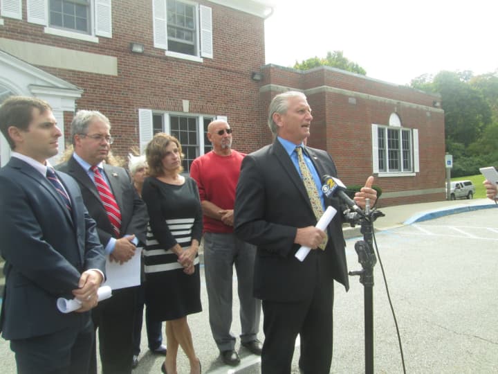 Yorktown Supervisor Michael Grace, flanked by Republicans, criticizes the Democrats for using email addresses obtained through a FOIL request to send campaign literature.