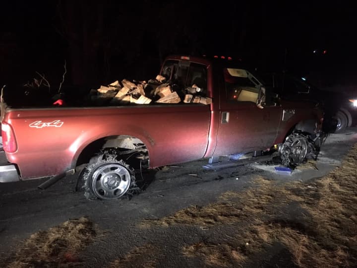 This Ford pickup crashed into a rock and two dogwoods before police caught up to it Friday.