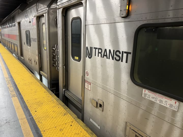 An NJ Transit train parked at New York Penn Station.