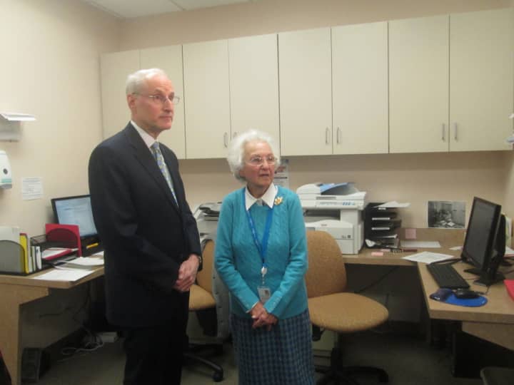 Betty Lupetin celebrates her 90th birthday with Dr. Scott Hayworth, CEO of CareMount Medical where she is an employee.