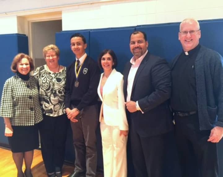 (from left to right) Superintendent for Catholic Schools Dr. Margaret Dames, Visitation Academy Principal Ms. Kimberly Harrigan, Ethan Cabral and his parents and Fr. Eugene Fields, Pastor of Our Lady of the Visitation Parish, in Paramus