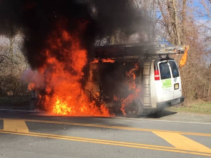 Neither the driver nor the passenger knew their van was on fire and walked away from the scene without injuries, thanks to the lieutenant&#x27;s quick action.