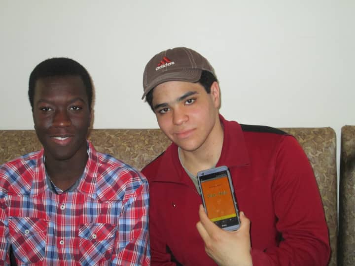 Xavier Mendez and Filipe Fonseca of Mount Vernon show off their mobile app.